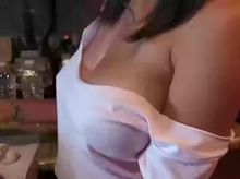 Revealing boobs while cooking