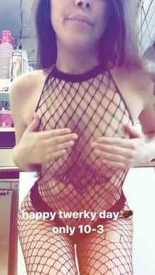 Shaking her butt in fishnets