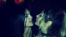 Womans Kissing in the Club