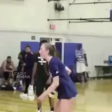 Chick from UCLA volleyball dunks in practice