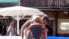 Mechanical bull riding adventure results in wardrobe malfunction