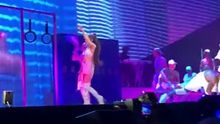 Ariana Grande pretending she's on a stripper pole