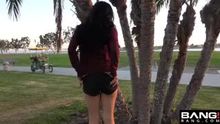 She takes off her shorts and shows her ass at the park