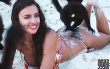 Irina Shayk has a lemur play on her bikini ass - looped