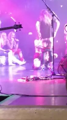 Chick gets eaten out on stage at Steel Panther concert