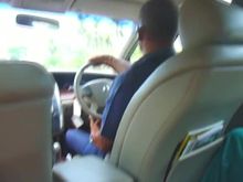 Sneaky blowjob in the backseat of a taxi