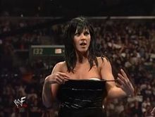 Miss Kitty showing her boobs to the WWF audience